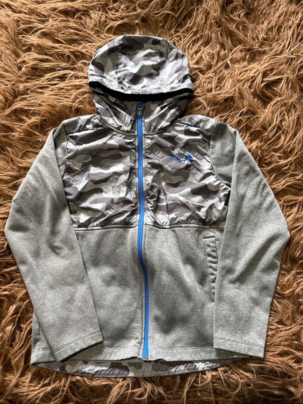 The North Face Gray Camo Jacket with Blue Logo and Trim